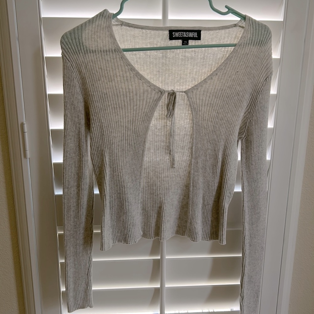 Cream cover up or top
